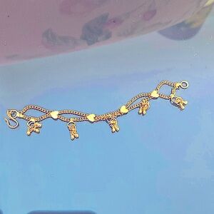 Gold tone baby bracelet, 3 hanging binky and little hearts with hook/eye closure